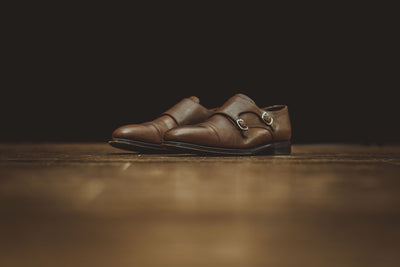 Why do men's dress shoes have heels?
